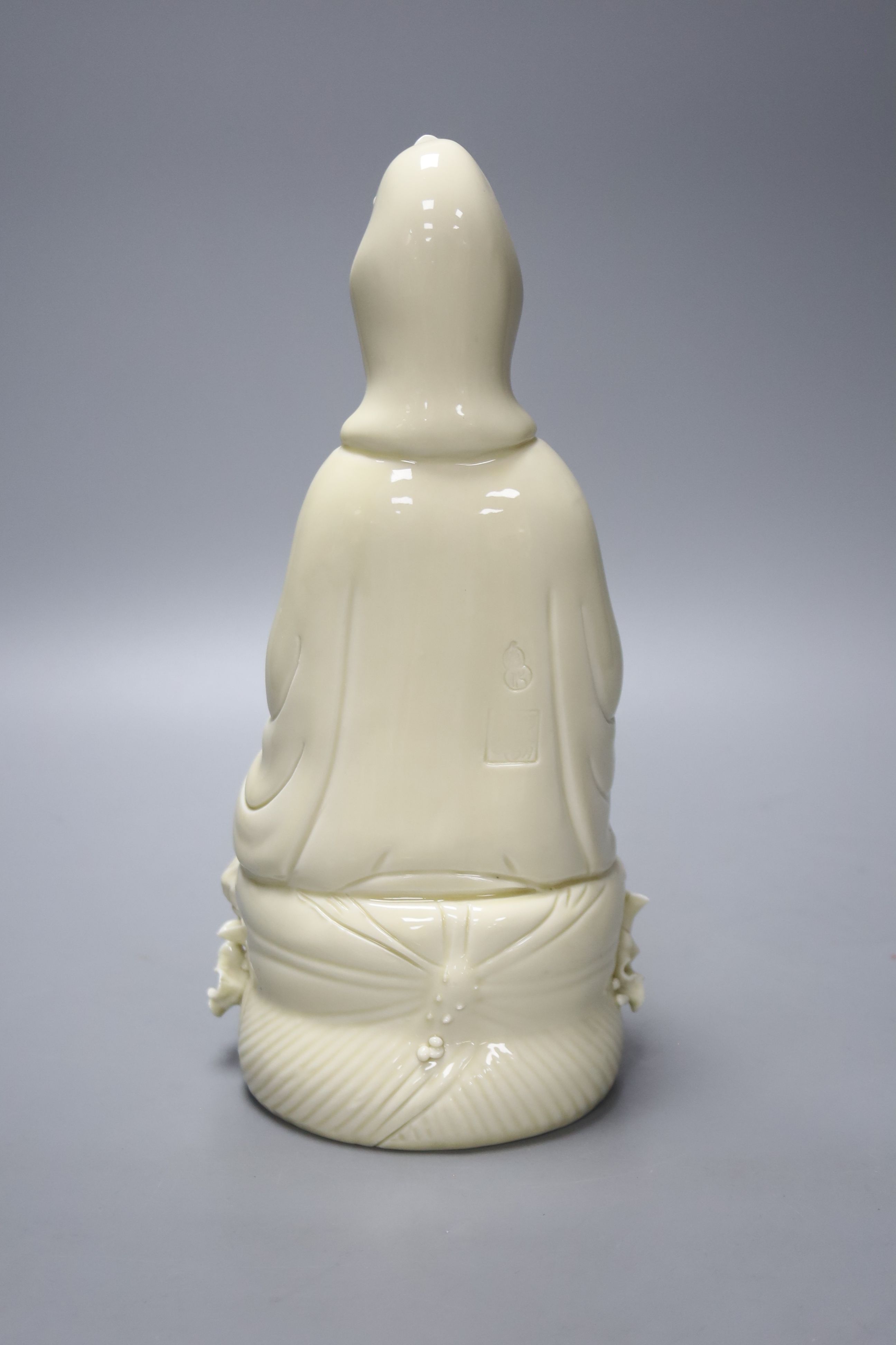 A Chinese Dehua blanc de chine figure, height 27cm